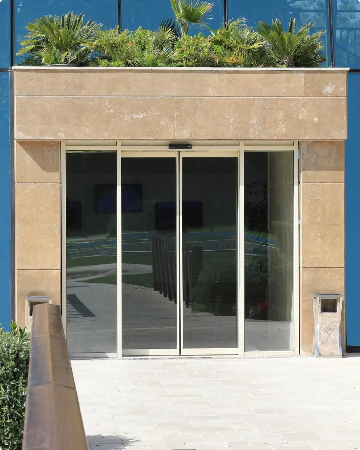 Commercial-grade automatic sliding door operator above a busy Northern Rivers business entrance