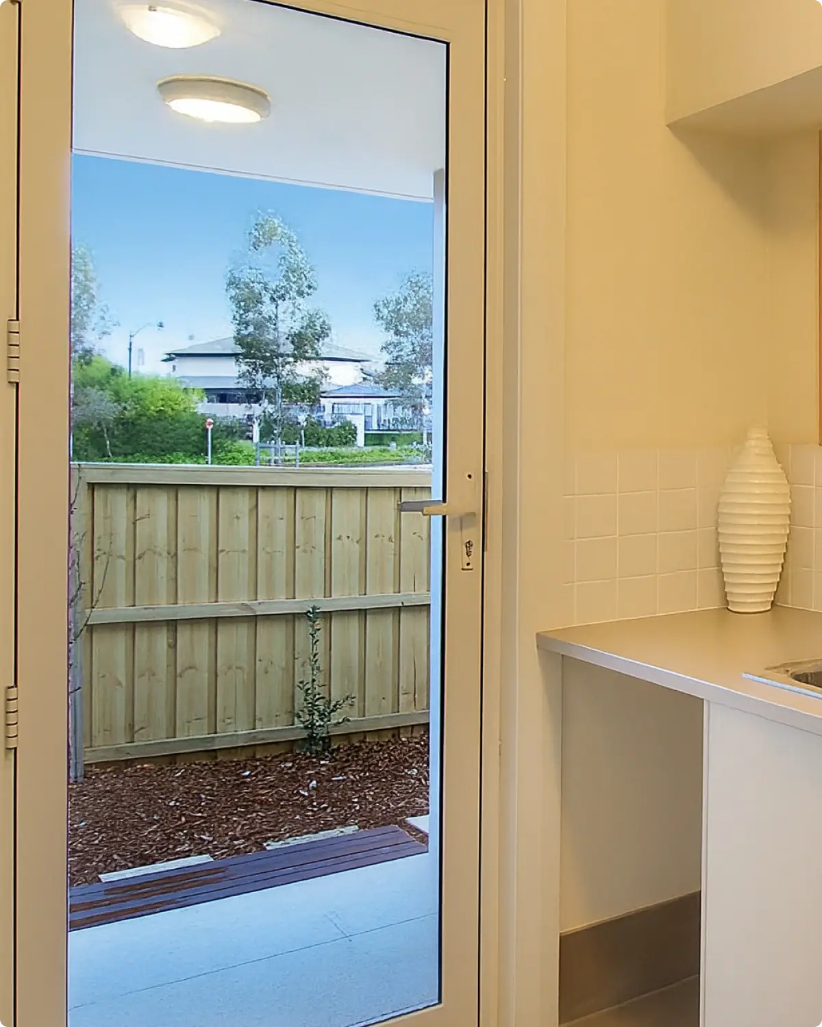 Black-framed custom aluminium glass doors manufactured in the Alumalite Ballina factory