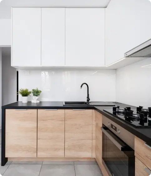 Coloured glass splashback in a contemporary kitchen