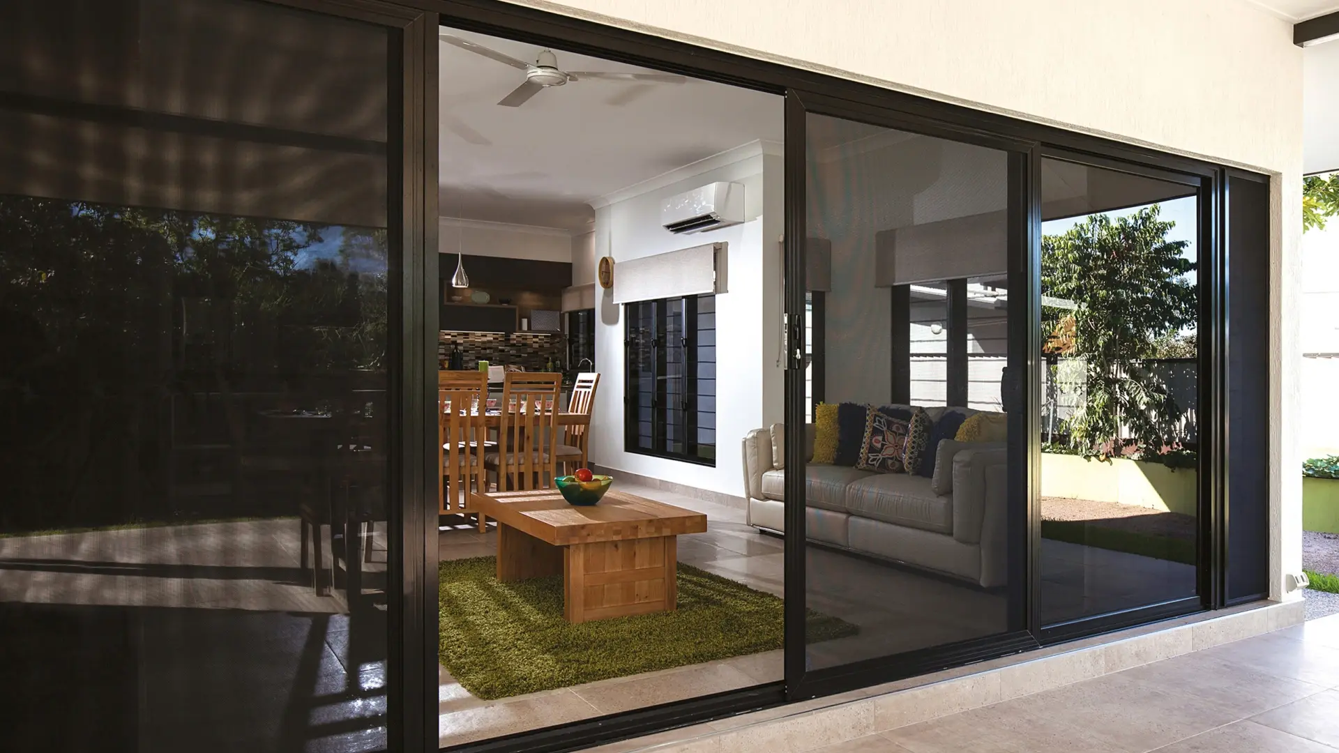 Floor-to-ceiling aluminium glazing in a coastal home