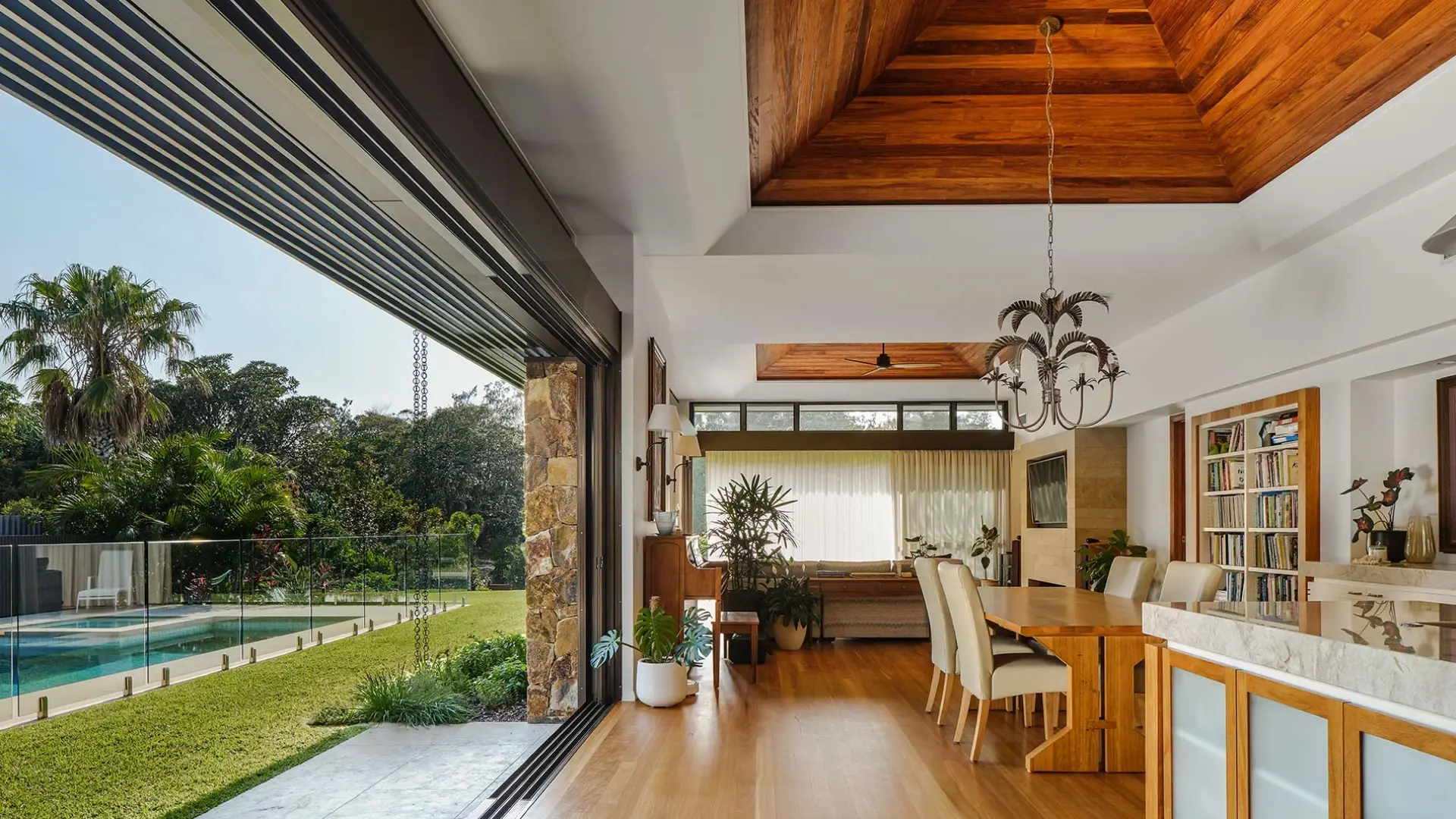 Aluminium sliding doors framing a garden view