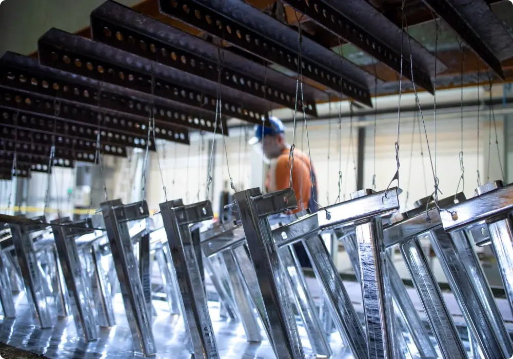 Craftsman checking aluminium window frames in Alumalite's Ballina factory