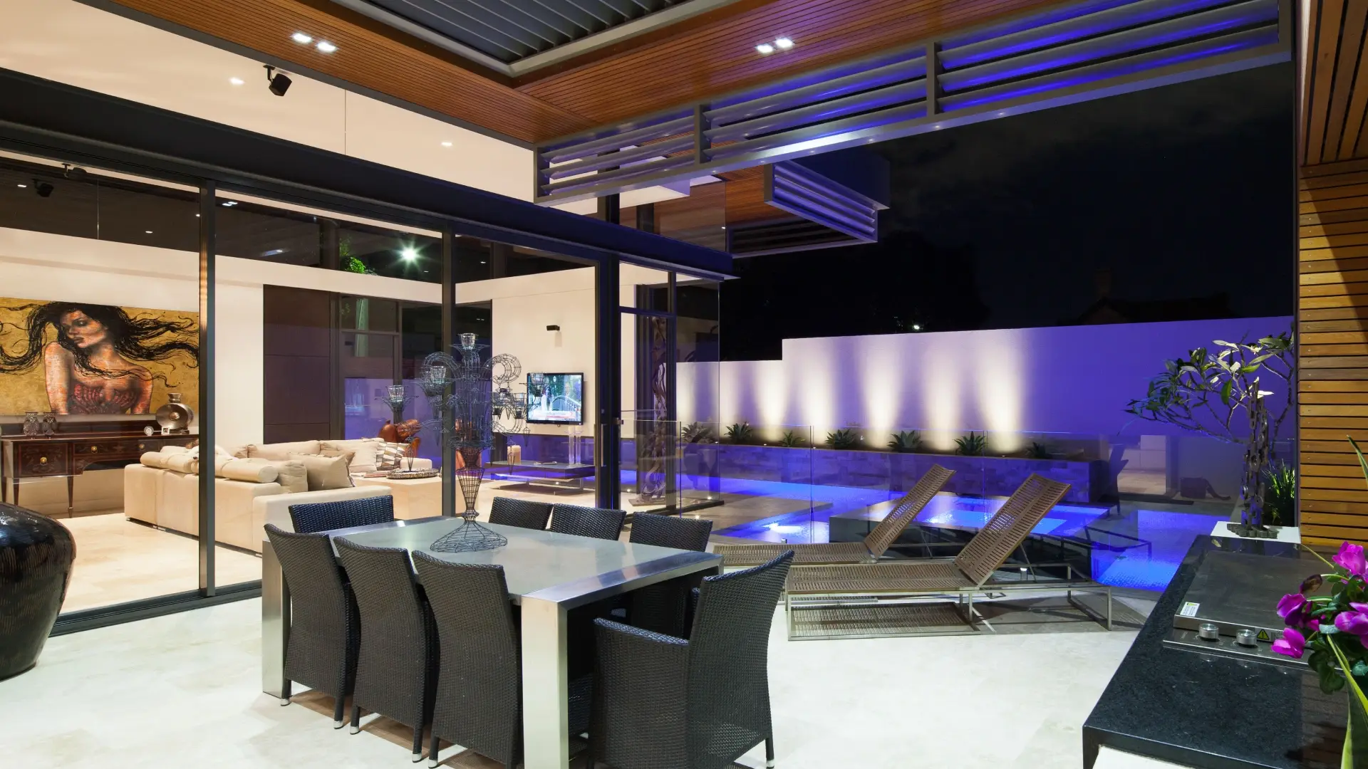 Custom aluminium sliding doors made by Alumalite opening a Ballina home to the outdoors