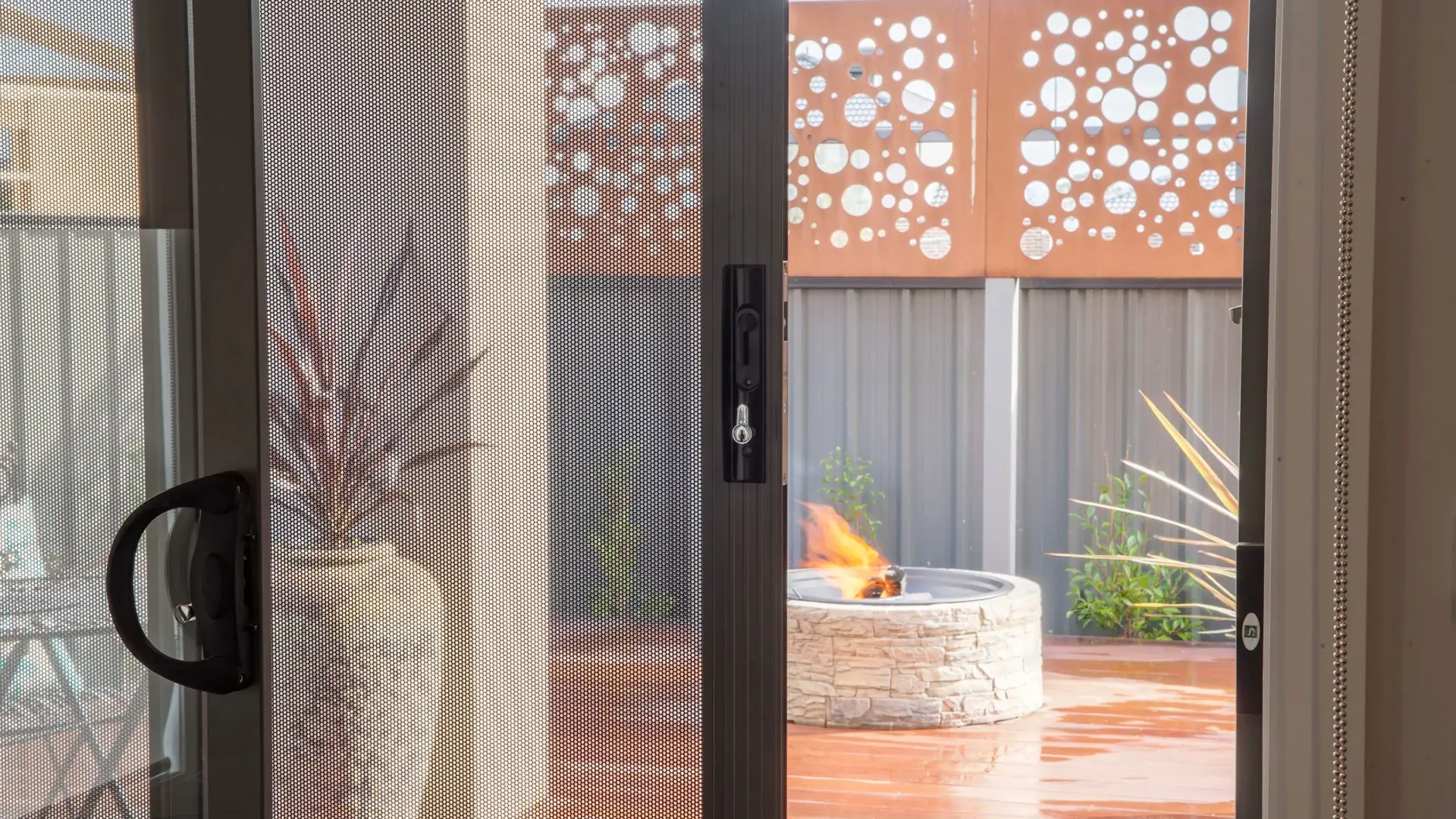 Stainless steel security mesh screen door fitted to a Northern Rivers home